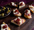 CRANBERRY PRESERVES, OLIVE & PROSCIUTTO WITH AGED RESERVE CHEDDAR
